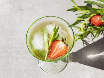 High angle view of fruits in glass on table