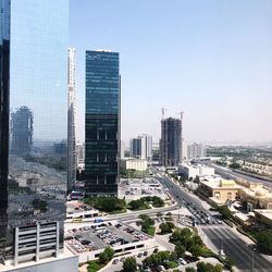 Modern buildings in city against sky