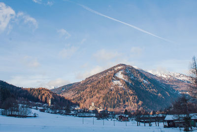 Scenic view of snowcapped mountains against sky