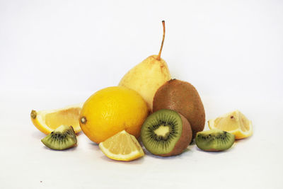 Close-up of fruits against white background
