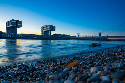 Scenic view of sea against clear blue sky