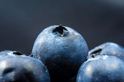 Close-up of fruit against white background