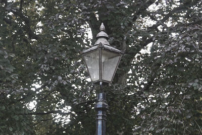 Low angle view of street light against sky