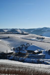 Scenic view of frozen lake against sky