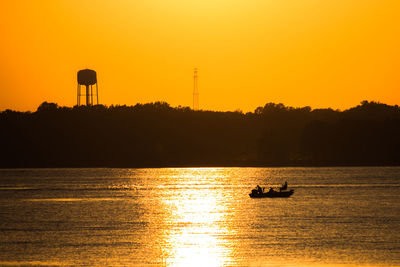 Scenic view of sea at sunset