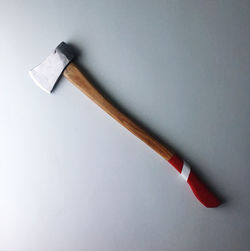 High angle view of paintbrushes against white background