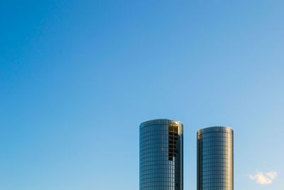 Low angle view of modern buildings against sky