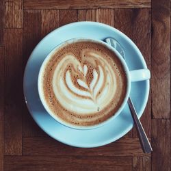 Directly above shot of coffee cup on table