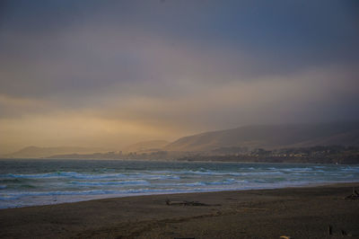 Scenic view of sea against sky at sunset