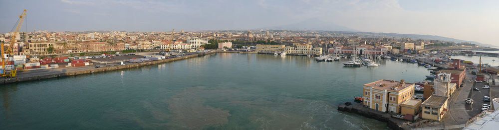 High angle view of river amidst buildings in city