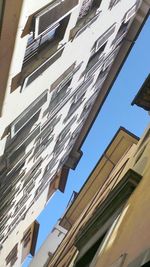 Low angle view of residential buildings against sky