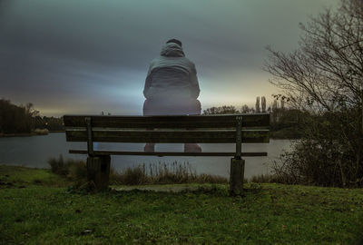 Built structure on landscape against sky at night