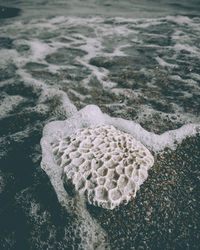 High angle view of sand on beach