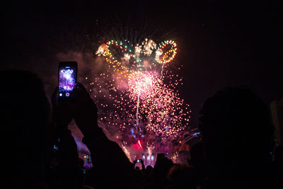 Firework display at night