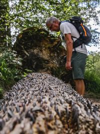 Full length of man standing on rock