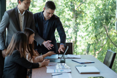 Business colleagues working at office