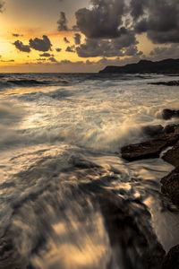 Scenic view of sea against sky during sunset