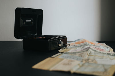 Close-up of camera on table