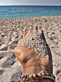 Low section of person on beach