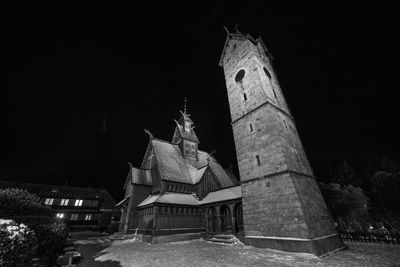 Low angle view of cathedral against sky at night