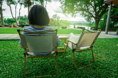 Empty chairs on field