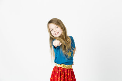 Portrait of a teenage girl against white background