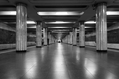 Man in illuminated corridor