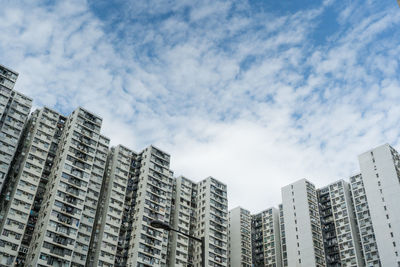 Low angle view of modern buildings against sky