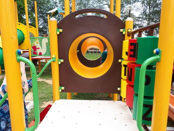 Close-up of yellow playground in park