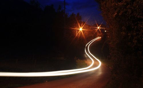 Light trails on road at night