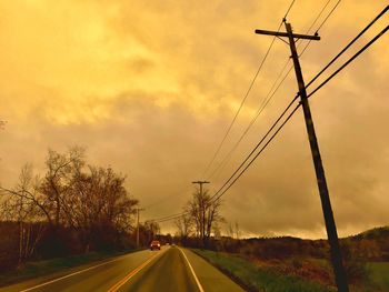 Road against sky during sunset