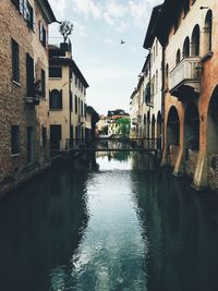 Canal passing through buildings