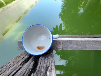 High angle view of coffee cup on table