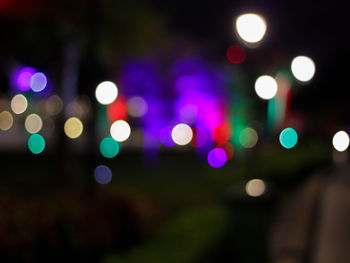 Defocused image of illuminated lights at night