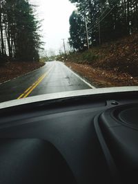 Road seen through car windshield