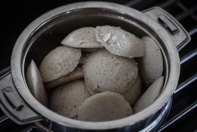 Close-up of idles in container on table