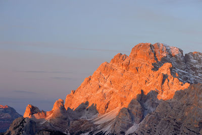 Rock formations on mountain against sky