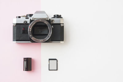 Close-up of camera against white background