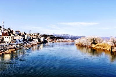 View of river with buildings in background