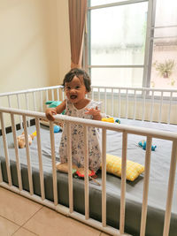 Portrait of baby girl at home