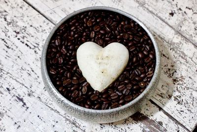 High angle view of heart shape coffee beans