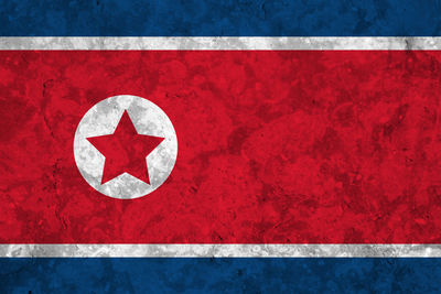 Full frame shot of north korean flag painted on wall