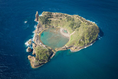 High angle view of island amidst sea