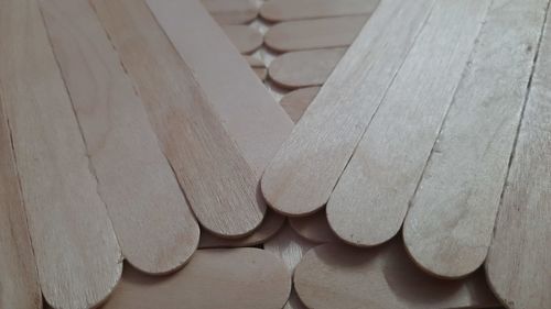 High angle view of paper wood on wooden table