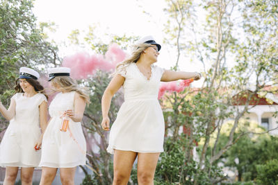 Women celebrating graduation