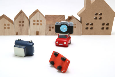 Close-up of toy car on table against white background