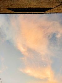 Low angle view of cloudy sky during sunset