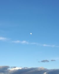 Low angle view of moon in sky