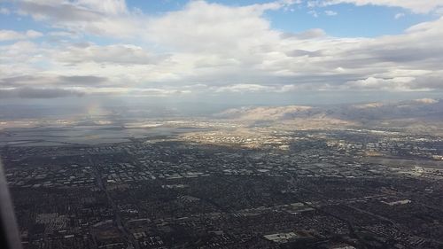 Aerial view of cityscape against sky