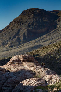 Scenic view of rocky mountains against clear sky